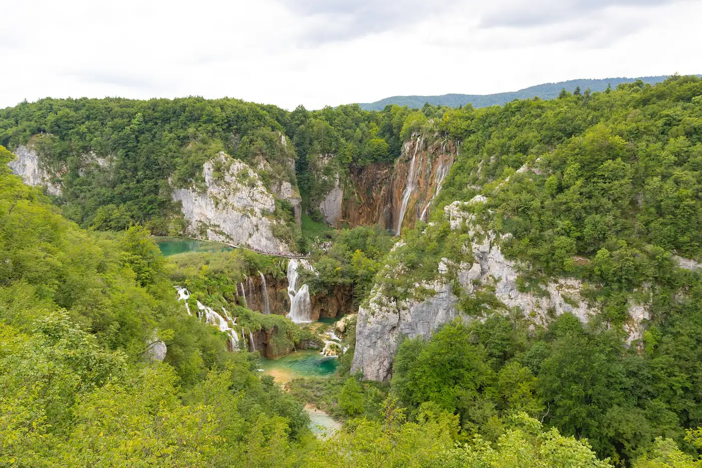 Wide view over the terraced cascades and turquoise lakes of the Plitvice system, the anchor of the Croatia waterfalls map
