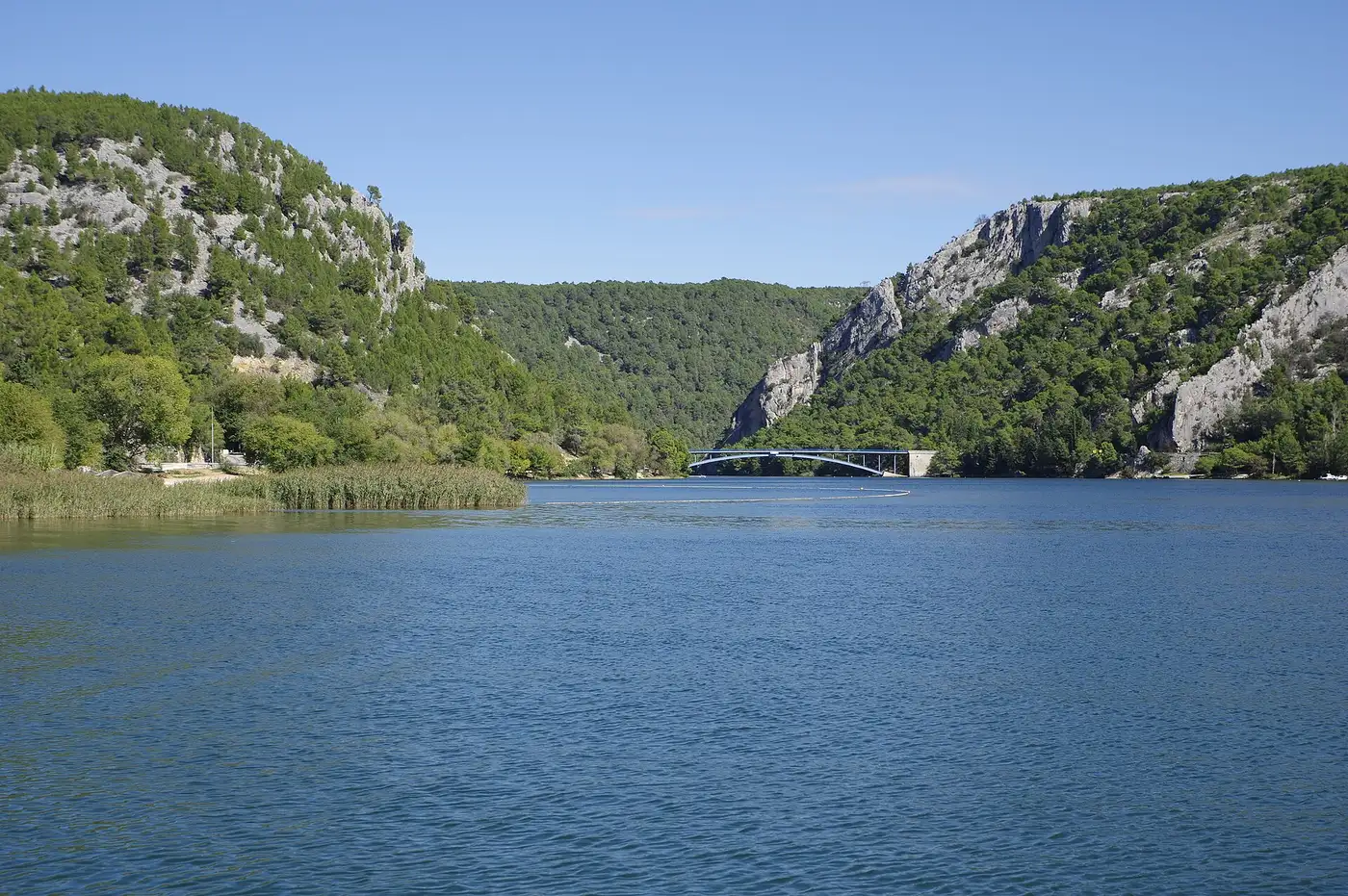 The boat crossing and boardwalk country that transit riders reach — croatia waterfalls without a car starts here